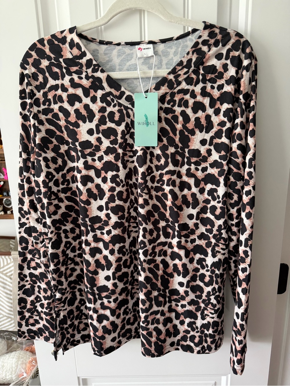Wiholl Blush Pink Leopard-Print Long Sleeve Tee - V Neck with slits on sides.
